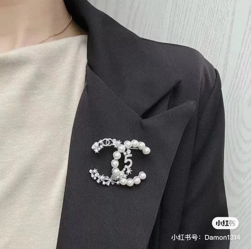 Ch**el brooches